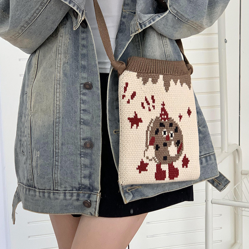 Bolso de hombro, bolso de mochila para mujeres versátil 2025 nuevo nicho de diseño lindo bolso de tejido de lana de dibujos animados bolso de teléfono celular