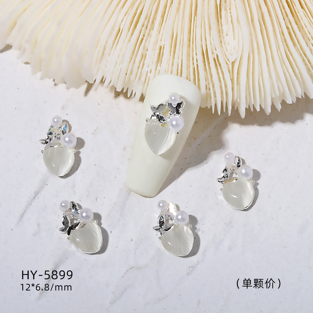 Venta caliente taladro de uñas arco de plata joyería tridimensional flash diamante esmalte de uñas decorativo diamante acabado pieza de uñas traje de joyería