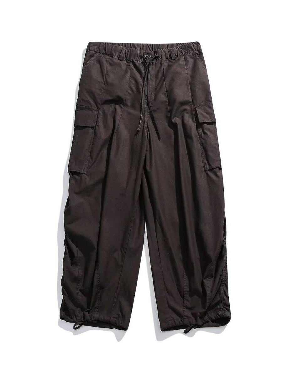 Estilo japonés americano al aire libre deportes delgados monopatín de pierna ancha los hombres y las mujeres con cordón ajustable suelta pantalones fregona