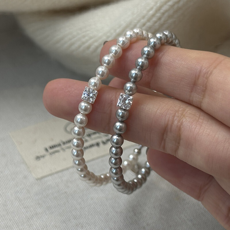 Simple French-Style Shijia Pearl Zircon Bracelet with a Sense of Design, Light Luxury, High-End Niche, Exquisite Elastic Cord Jewelry Simple French-Style Shijia Pearl Zircon Bracelet with a Sense of Design, Light Luxury, High-End Niche, Exquisite Elastic Cord Jewelry