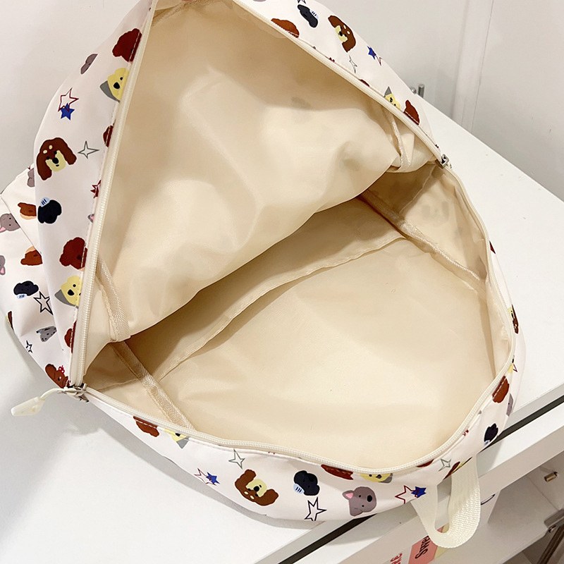 La nueva mochila con estampado de dibujos animados simple reduce la carga de los estudiantes de primaria y secundaria, pequeña mochila escolar fresca, mochila de viaje de ocio