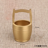 Brass jewelry, golden water, table bucket