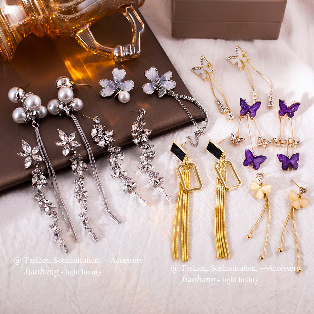 Pendientes largos con flecos elegantes y diamantes con aguja de plata Pendientes de todo fósforo de temperamento de nicho Pendientes simples y ligeros de lujo de alta gama Mujeres
