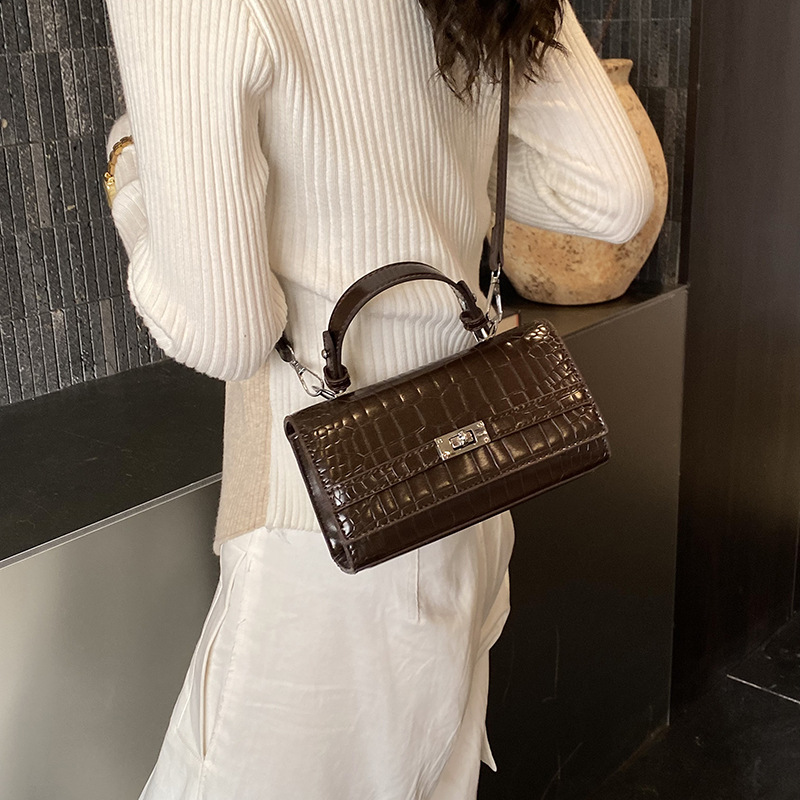 Sentimiento diario de cocodrilo Kelly bolso para mujeres 2026 nuevo diseño de nicho retro bolso de mano de viaje mochila de hombro