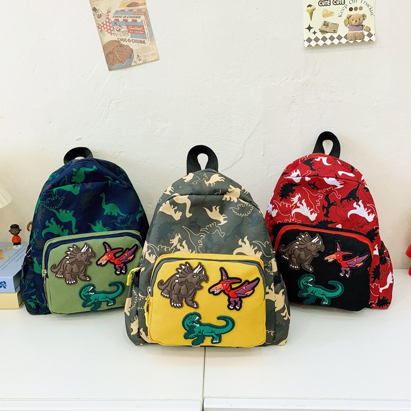 Mochila infantil de dinosaurios de dibujos animados, 2025 mochila escolar de jardín de infantes, nueva mochila de comercio exterior para niños y niñas