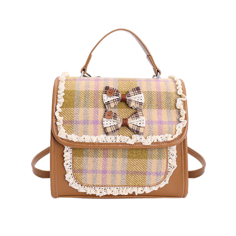 Nuevo bolso de niños a cuadrillas, escuela de artes, estilo mini mochila de estudiantes, lindos arcos, bolsas de hombro para hombres y mujeres.