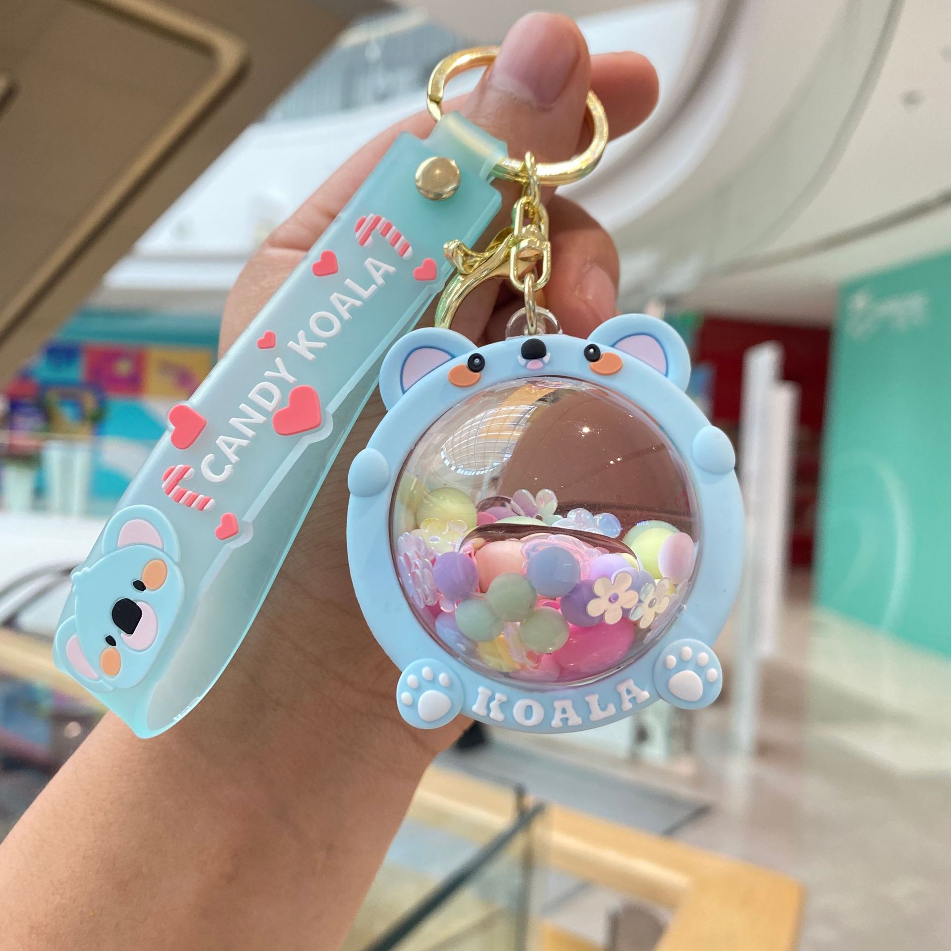 Acrílico lleno de aceite de melocotón llavero pareja bolsa colgante coche llavero lindo pequeño regalo al por mayor