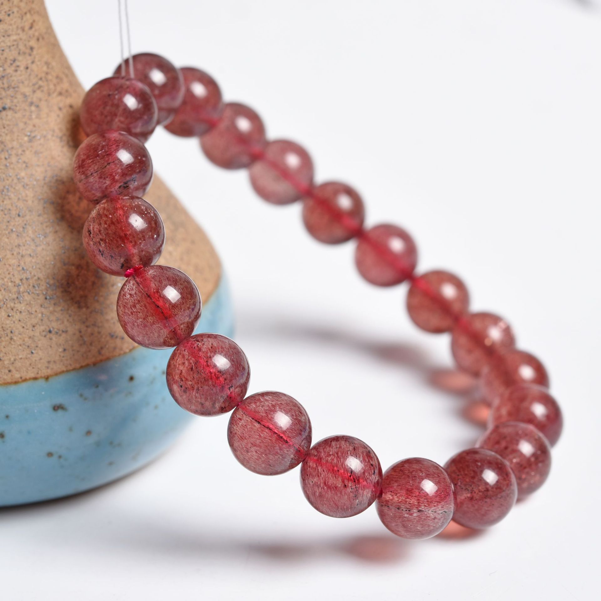 智贝详情图_0富宏珠宝厂家6A深色红草莓晶天然草莓晶手链手串