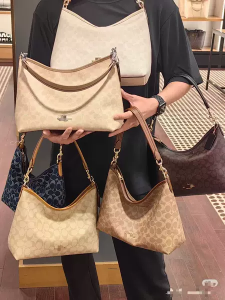 Koja 2026 new laurel31 commuter bag in milk tea color, featuring a classic monogram pattern, can be carried as a shoulder bag, crossbody bag, or handbag