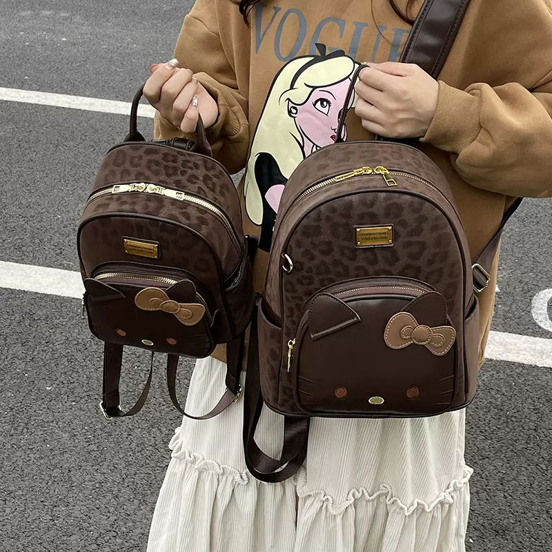 韩版爆款kt萌脸双肩包女2025新款大容量豹纹猫可爱背包旅行小书包