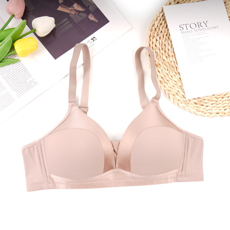 Fábrica de Shantou punto sin anillo de acero sujetador de mujer una pieza de ajuste cómodo sin marcas juntar sujetador de ropa interior anti-caída