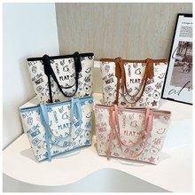 撞色大包包女2025春夏季新款可爱卡通印花单肩包简约手提托特包