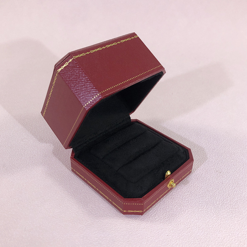 ヨーロッパ式のプリント八角形のアクセサリーの箱の赤いダイヤモンドの指輪の箱はボタンを押して指輪の箱の求婚の指輪の箱のメーカーに対して直接販売します。|undefined