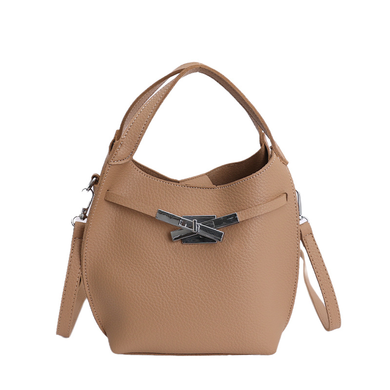Bolso de mujer nuevo estilo coreano nicho de moda lichi bolso de cubo portátil de alta sensación de ocio mochila de viaje