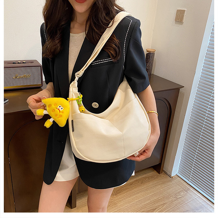 Simple solid-color canvas bag 2024 new style Japanese large-capacity single-shoulder dumpling bag, versatile for school and commuting crossbody bag undefined