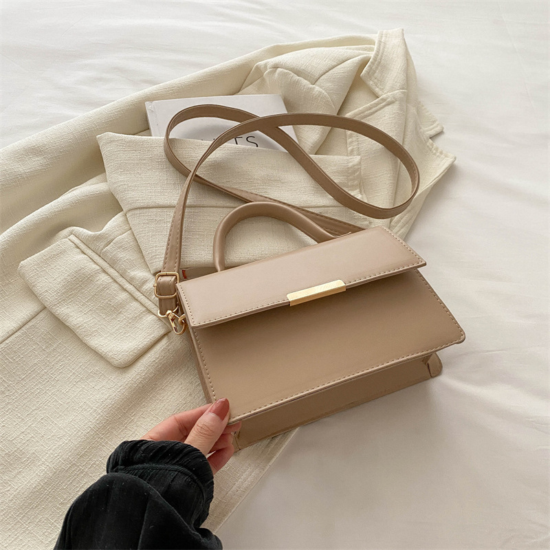 Este año la nueva explosión de bolsos de mujer de alta calidad sensación extranjera bolsos de mano versátiles ligeros de lujo nicho bolsos de hombro de un solo hombro