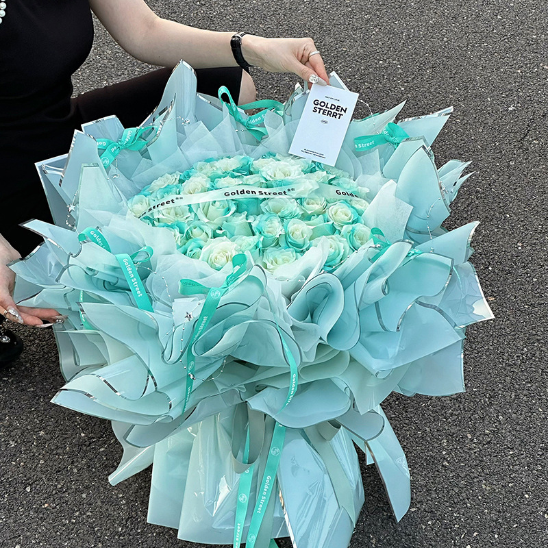 Brillante Qixi día de San Valentín iones de plata papel de embalaje de flores plástico impermeable OPP película de bordes de plata florista