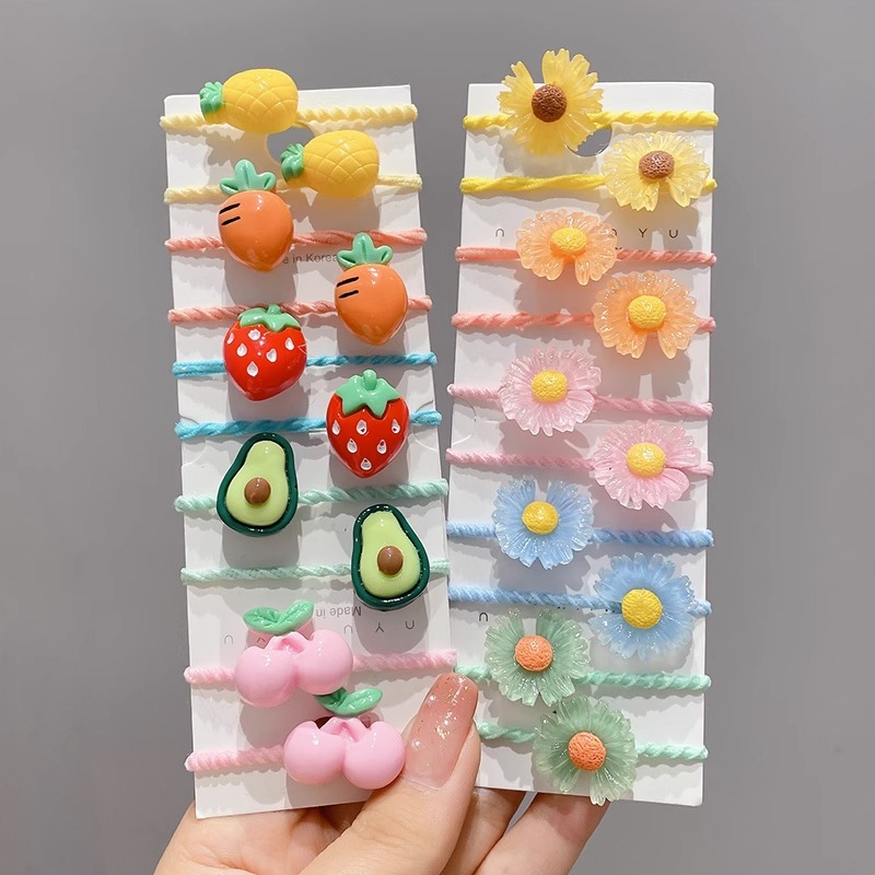 La cuerda del pelo del bebé de las muchachas de la banda de goma de los niños no lastima el pelo Los accesorios del pelo del pulgar del tamaño pequeño atan la banda de goma del pelo