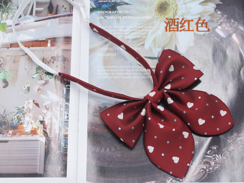 Spot al por mayor amor corbata de pajarita de oreja de conejo mujer jacquard de seda de poliéster más estilo universitario duro pajarita de pajarita flor de diez colores