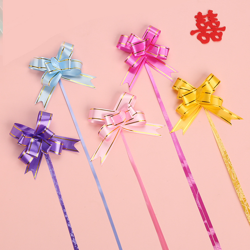 Borde dorado mano tire flor arco cinta regalo embalaje tire flor suministros de la sala de bodas boda decoración del coche de la boda tire Flor al por mayor