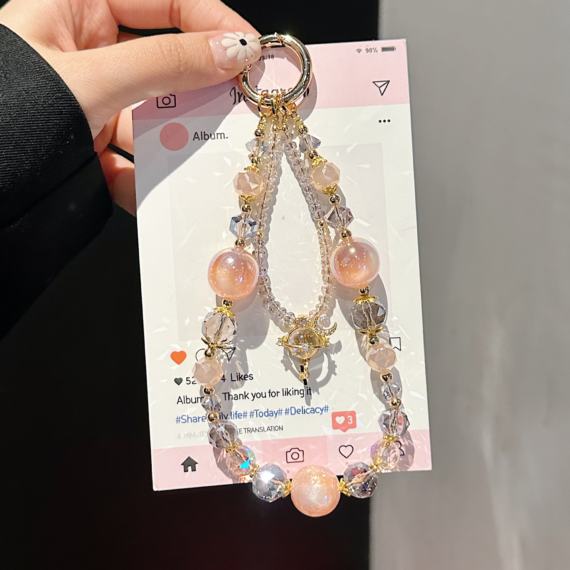 Boutique hecho a mano de alta gama para teléfono móvil cadena larga de vidrio de universo pequeño femenino cordón de teléfono móvil de moda colgante de mensajero largo