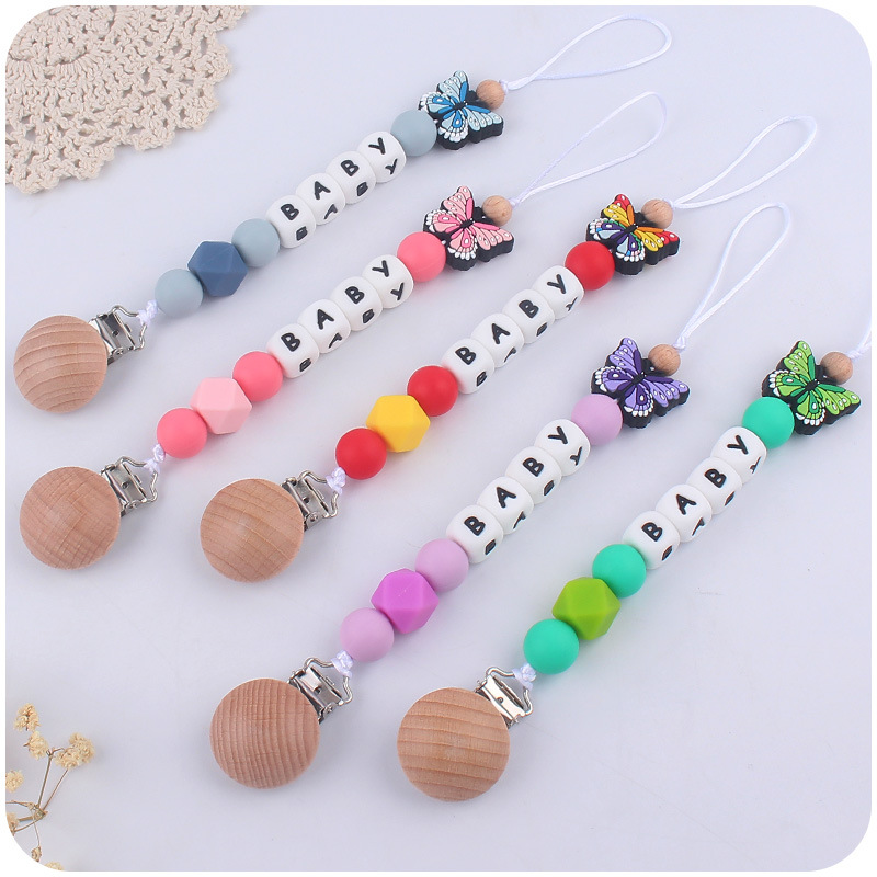 Nuevo bebé de dibujos animados animal mariposa Pavo Real búho mordedor calmante bebé molar pezón anti-gota cadena