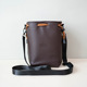 Camera storage bag - light brown medium + black shoulder strap can be worn on one shoulder or crossbody