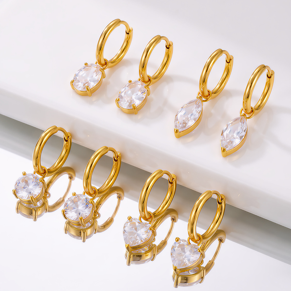 Fashionable stainless steel geometric minimalist cubic zirconia round heart-shaped earrings for women, featuring a unique and delicate design, and made with titanium steel that won't fade