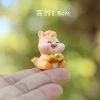 Holding Yuanbao (in opp bag)
