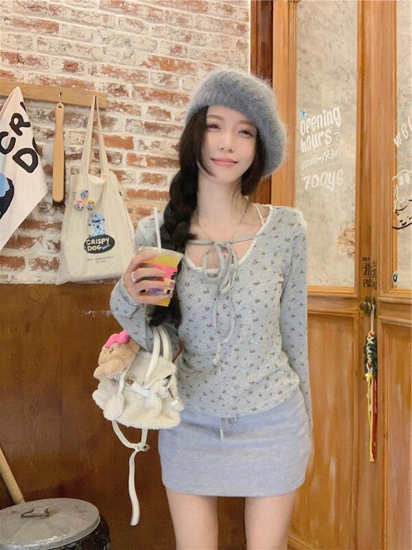 純粋な欲望のギャルの長袖のtシャツの女性の花のシャツは身を修めてやせていることを現します。|undefined