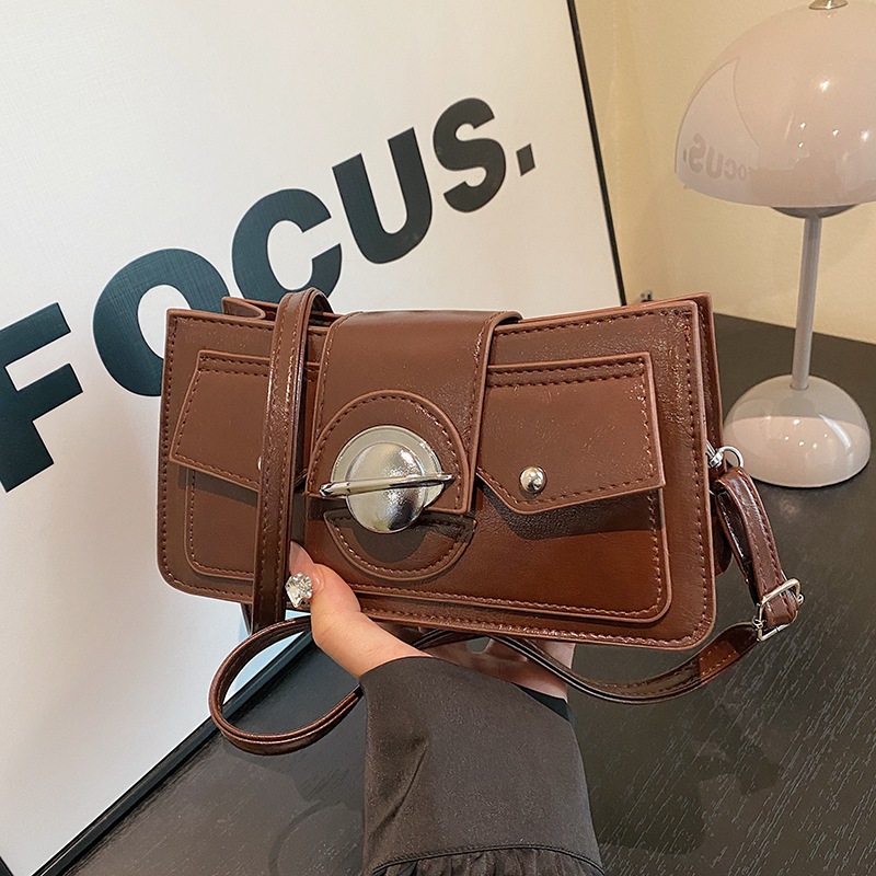 Literaria y artística personalidad de la moda extranjera textura bolso de brazo para mujeres 2024 nuevo estilo mochila de moda simple bolso de hombro