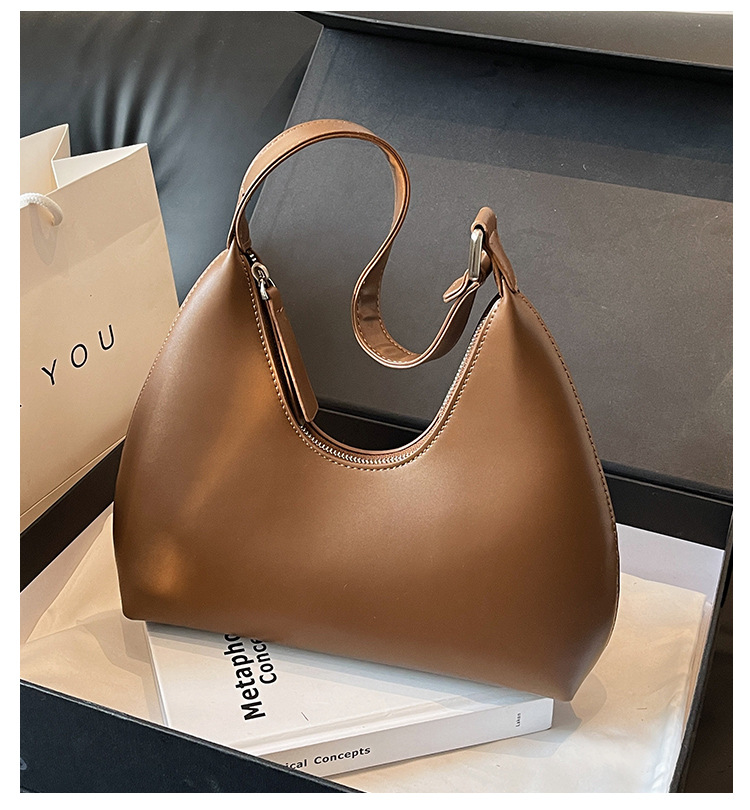 Sotto le ascelle da donna 2024 nuovo modello minimalista a mezzaluna con temperamento versatile, viaggio casual, consistenza portatile,_voghion.com