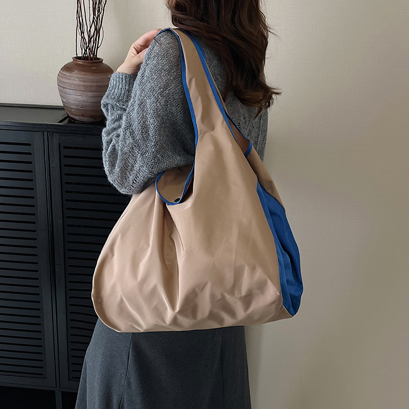 Solid color nylon foldable capacious handheld shopping bag one…
