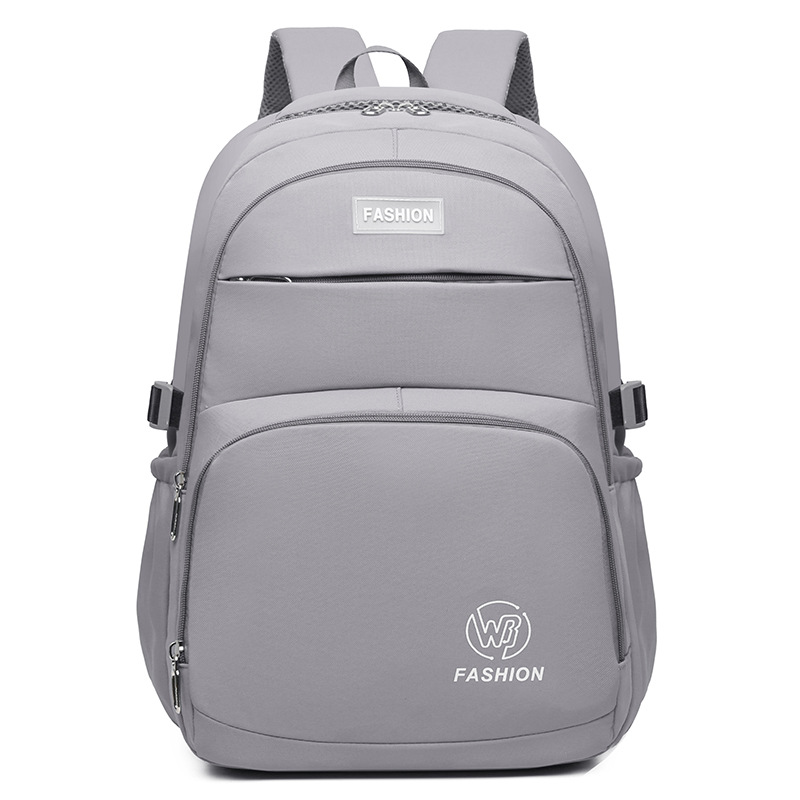 Al por mayor nueva mochila simple, mochila de viaje casual de moda, mochila de gran capacidad para estudiantes de primaria y secundaria para reducir la carga