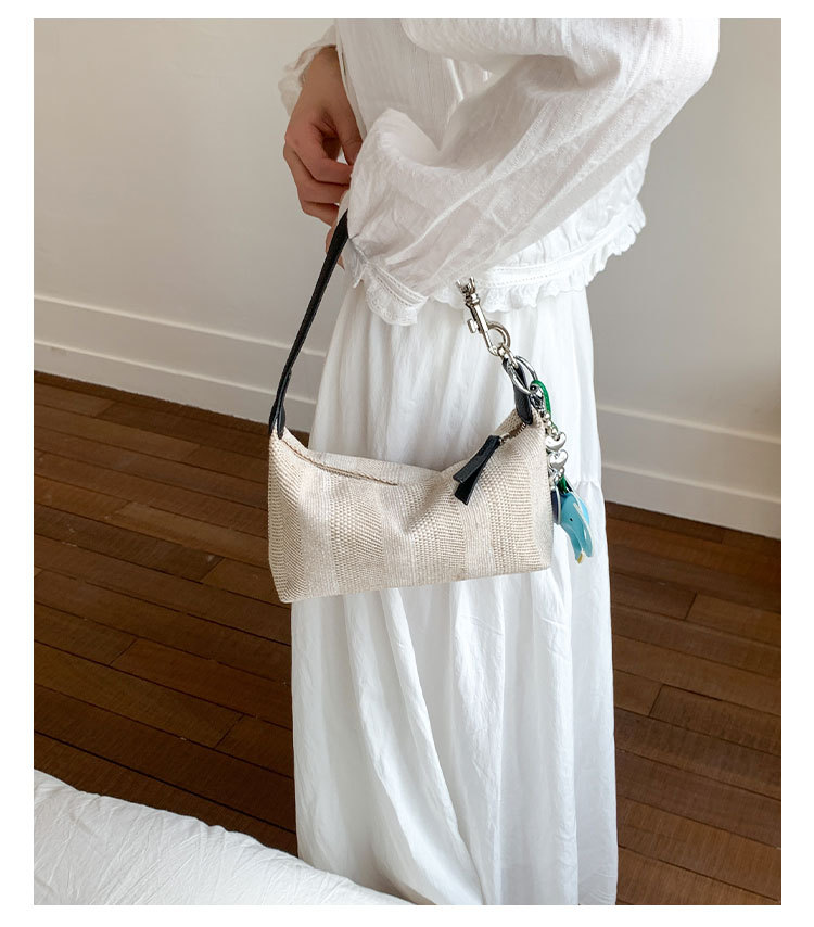 A simple, versatile, fashionable and trendy solid-color underarm bag for women, a new summer 2025 stylish and casual woven single-shoulder crossbody bag undefined