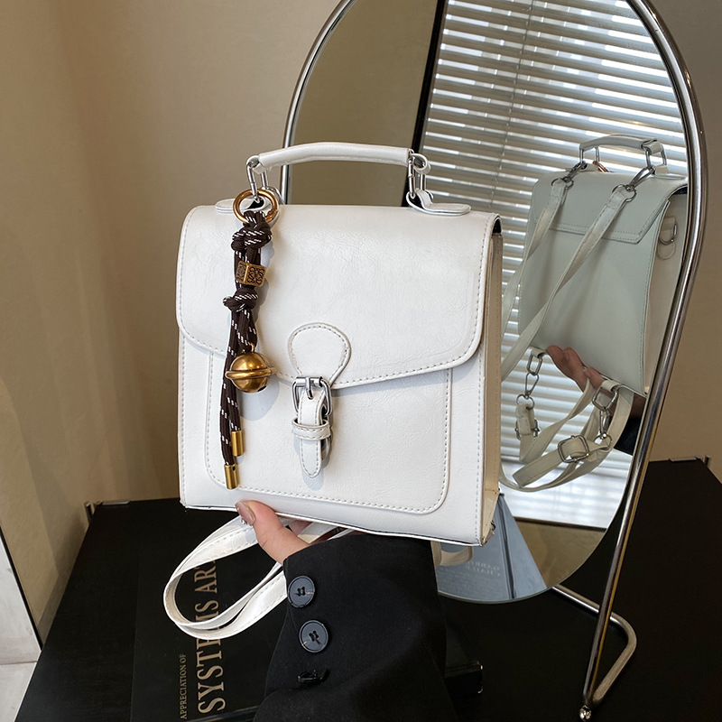 2025 nuevo estilo de moda de piel de cera de aceite de gran capacidad bolsa de viaje mochila multifuncional mochila de hombro color sólido