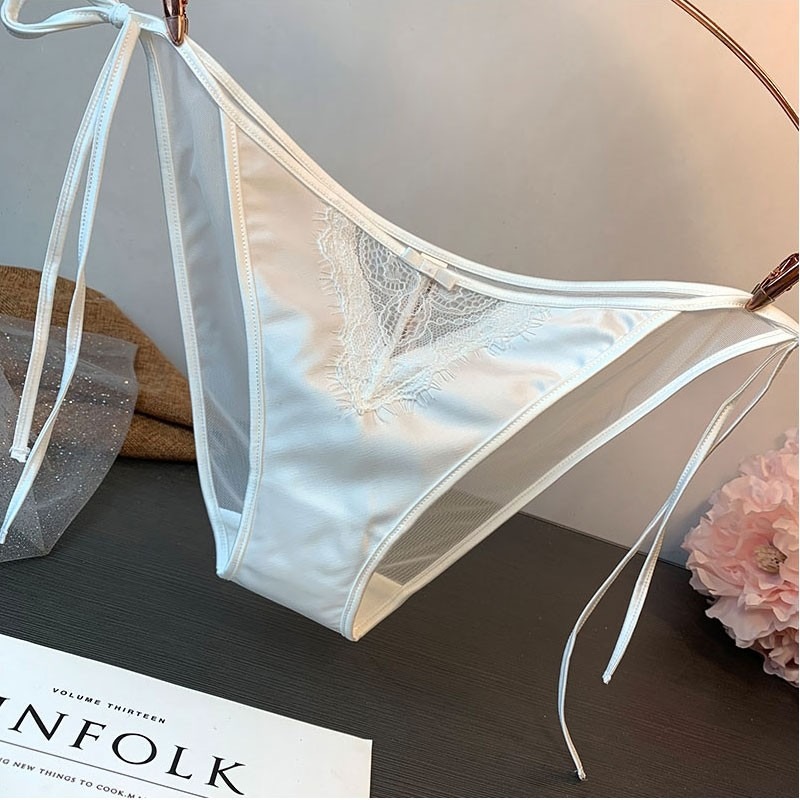 Europa y América sexy ropa interior de seda artificial las mujeres arco cintura baja media vaina moda algodón entrepierna calzoncillos cómodos