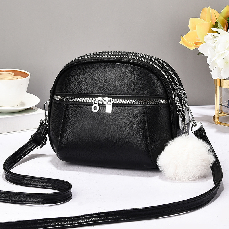 Versión coreana de varios compartimentos de alta calidad para damas bolso cuadrado pequeño bolso de hombro de moda de verano 2025 nuevo bolso de mensajero de todo fósforo