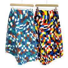 夏季女装2025新款不规则印花格子茶歇高级感蓝色宽松格子半身裙女