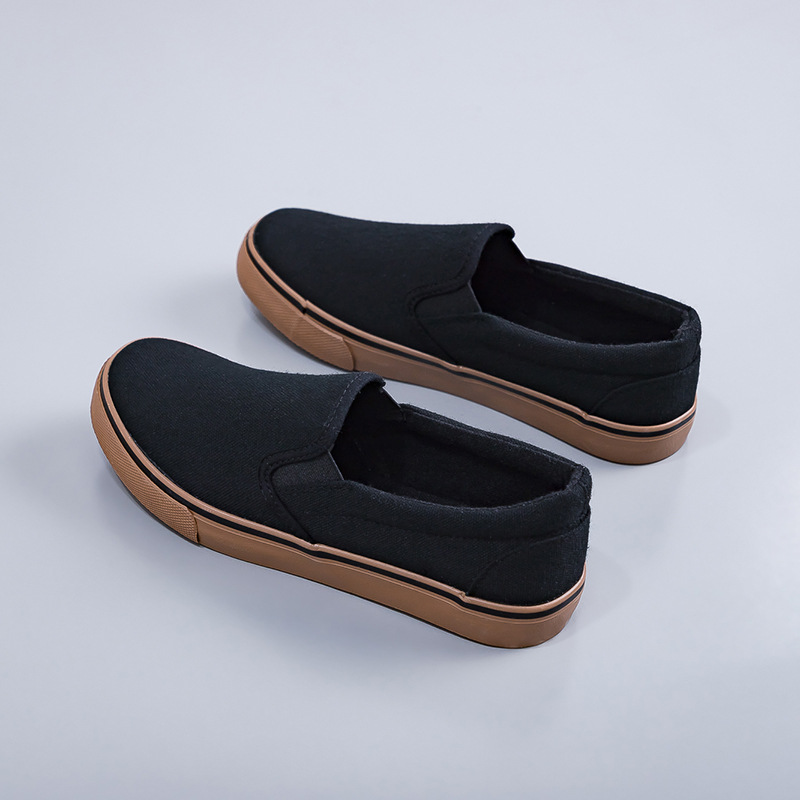 Hombres y mujeres zapatos de lona a cuadros negros y blancos de primavera 2026 nuevos zapatos deportivos casuales de estudiantes de estilo coreano tablero de ajedrez zapatos de skate para parejas