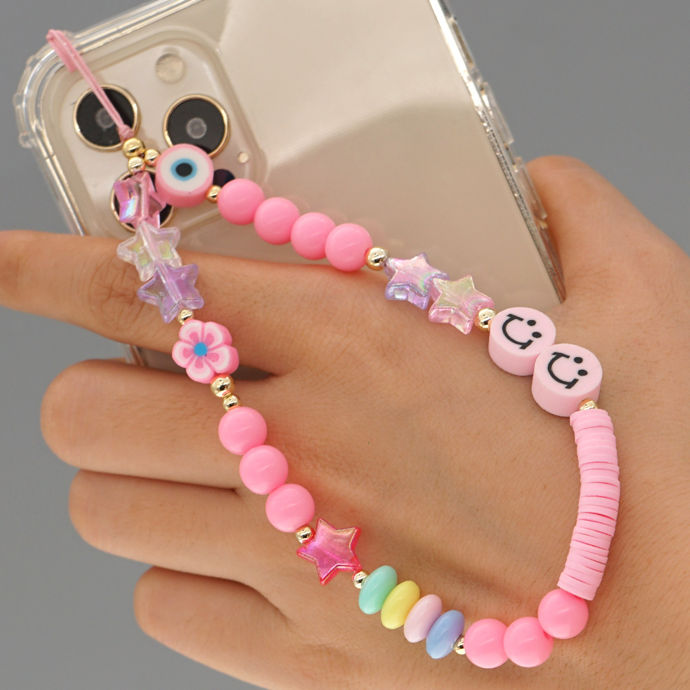 Nihaojewelry wholesale accessories acrylic pink round bead smiley face soft ceramic phone chainpicture1