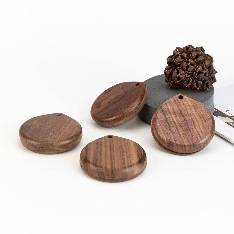 Ventas transfronterizas de nueces negras de alta definición de maquillaje de mano espejo de doble cara espejo de maquillaje de madera giratorio espejo de bolsillo portátil