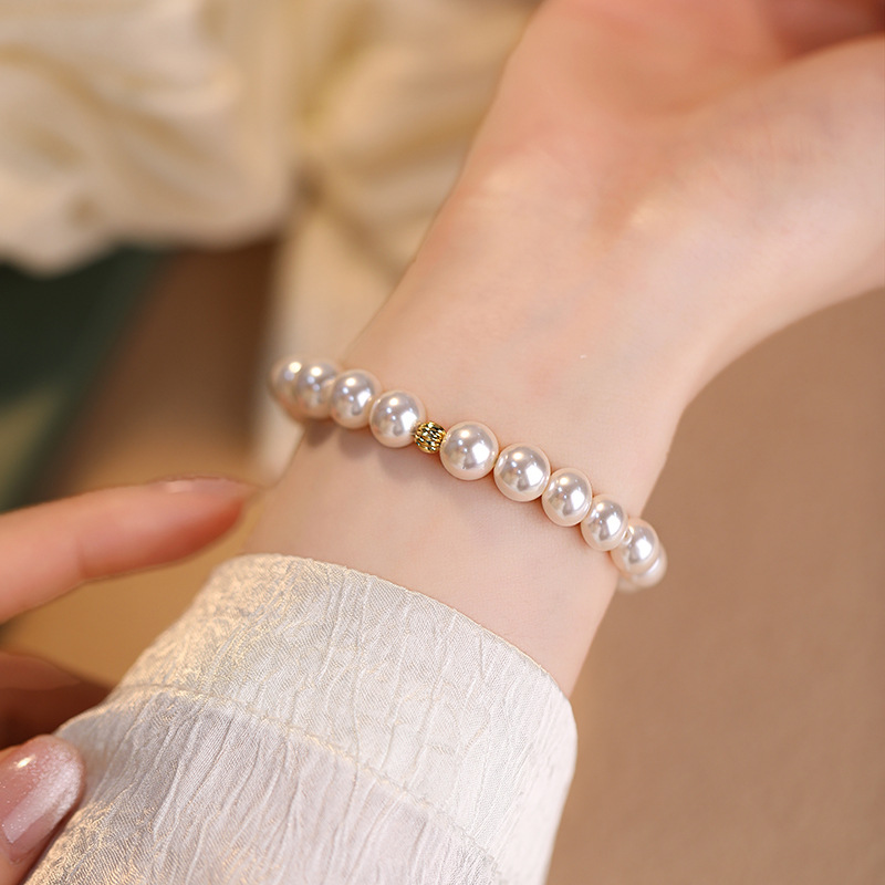 SKU_2_6mm珍珠手链 车花金珠.jpg