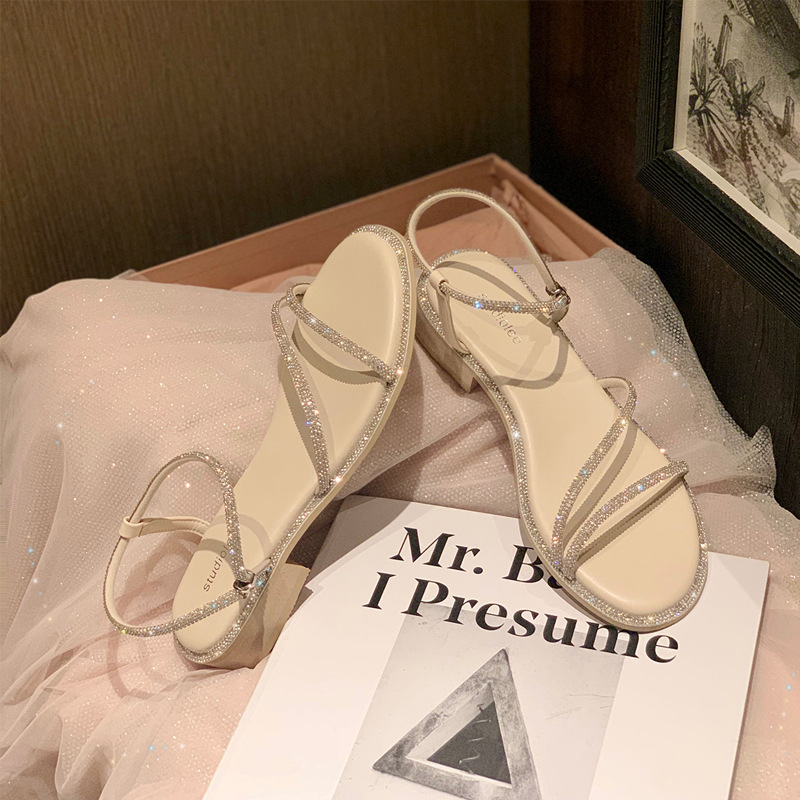 Sandalias planas con diamantes de imitación para mujer, prendas de vestir exteriores de verano, estilo de hadas Ins, falda a juego, sandalias romanas con correa, novedad de 2024