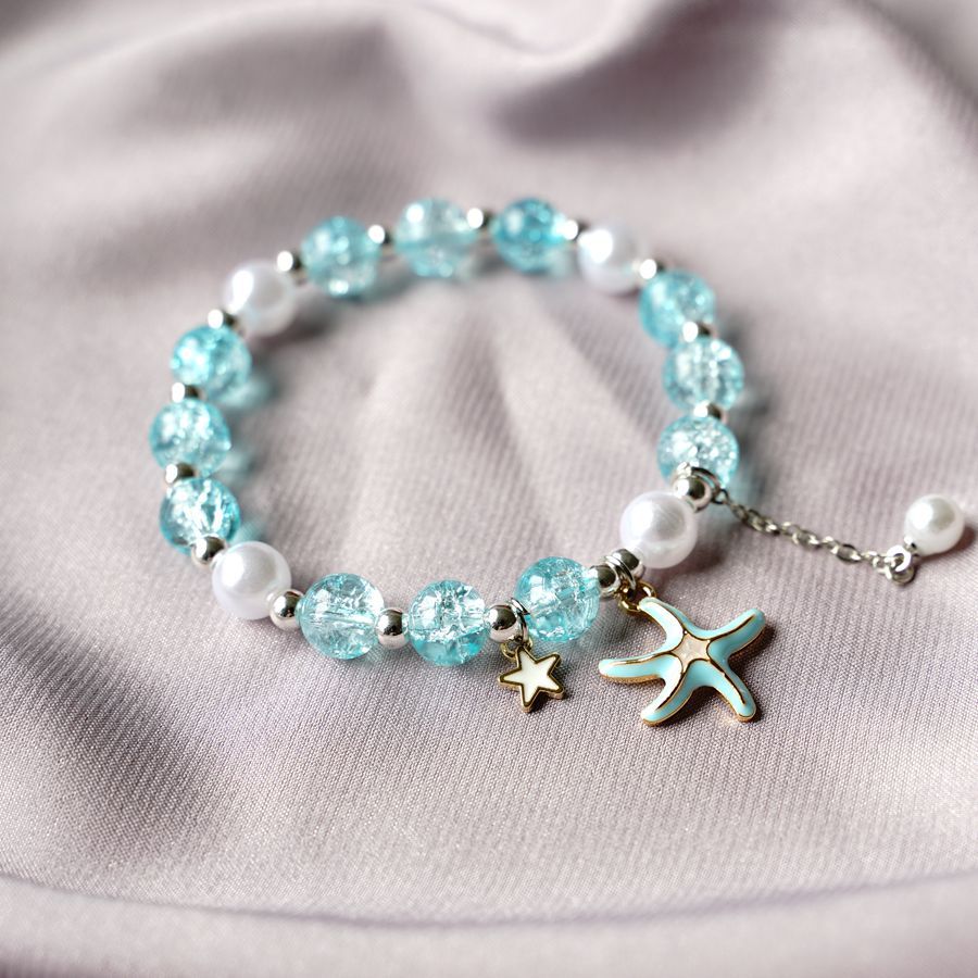 thumbnail image 1 of El nuevo temperamento literario y artístico estallando cristal perla concha estrella de mar pulsera diseño de minoría femenina bestie pulsera joyería transfronteriza azul estrella de mar uno, 1 of 2