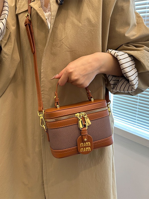Caja de mano retro bolso cuadrado para mujeres 2025 comercio exterior transfronterizo nueva moda de color contrastante empalme mochila de hombro
