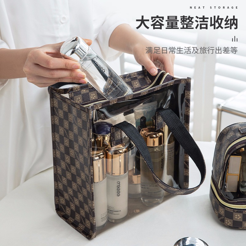 La nueva bolsa de cosméticos de alta calidad de gran capacidad, un lote de bolsa de almacenamiento transparente impermeable de PU, bolsa de lavado de almacenamiento de viaje