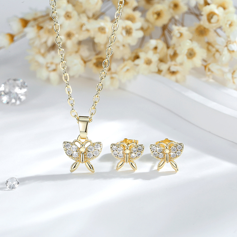 Nicho de moda mariposa conjunto de joyería para mujeres 14K oro zircon colgante mariposa pendientes venta caliente transfronteriza