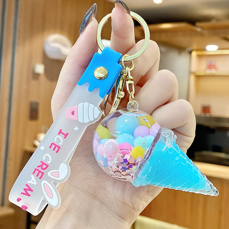 Arenas flotantes transfronterizas coloridas frijoles botellas flotantes de helado llaveras de chicas bolsos colgantes de arena flotante pequeña decoración colgante para mujeres