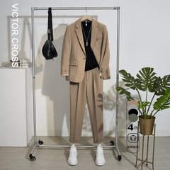 カジュアルスーツの男性春と秋の韓国版のゆったりしたヤクザの男性の生港風の高級感の小さいスーツのコート